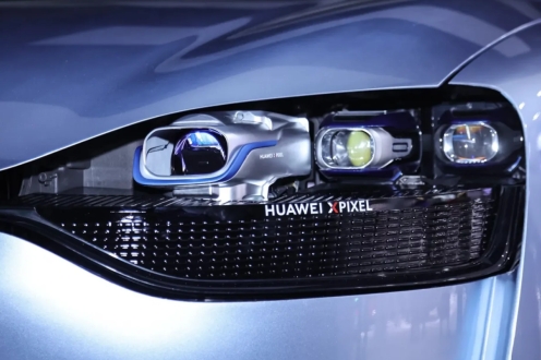 Headlight projectors turn a car into a drive-in movie theatre
